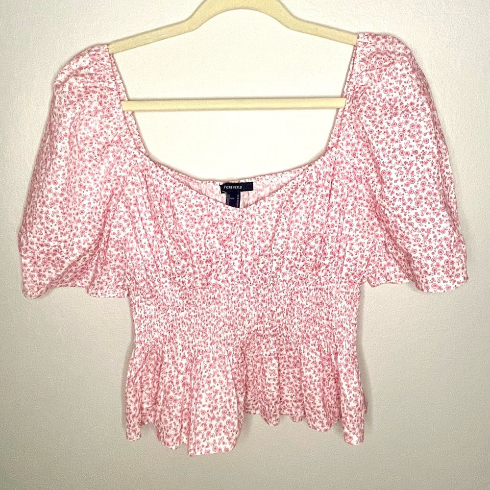 Red and white floral blouse
